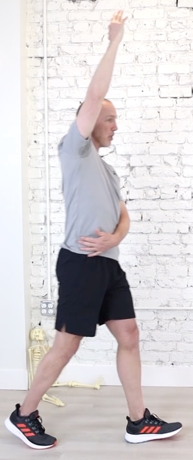 Walking with the arm on the painful side raised straight overhead